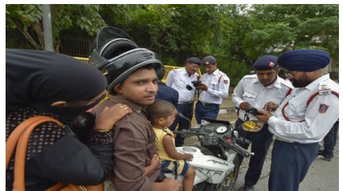 Police hands over Rs 23,500 challan to Haryana biker