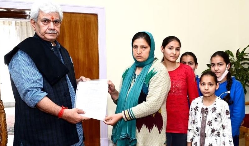 Lt Governor hands over appointment letter to martyr civilian Suneel Pandith’s wife