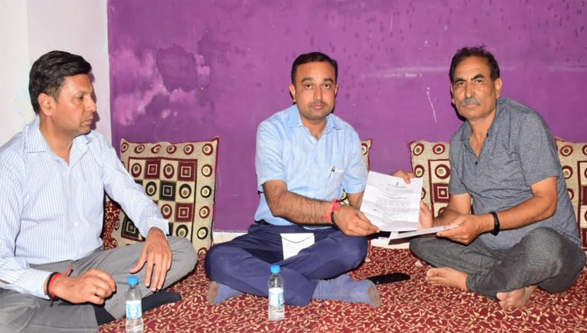 Div Com Jammu hands over Appointment letter, Ex gratia amount to Rahul Bhat's family