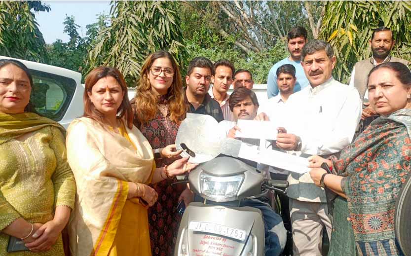 Jugal Kishore MP dedicated Motorized Scooters to Physically Challenged Persons from MPLADS