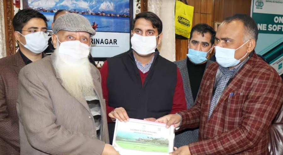 Div Com Kashmir, DC Srinagar hand over Land Passbooks to land owners