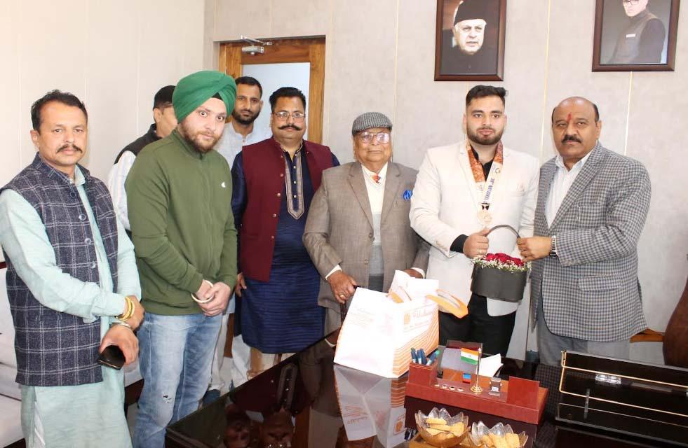 Deputy Chief Minister felicitates Bronze medalist, Rajat Singh