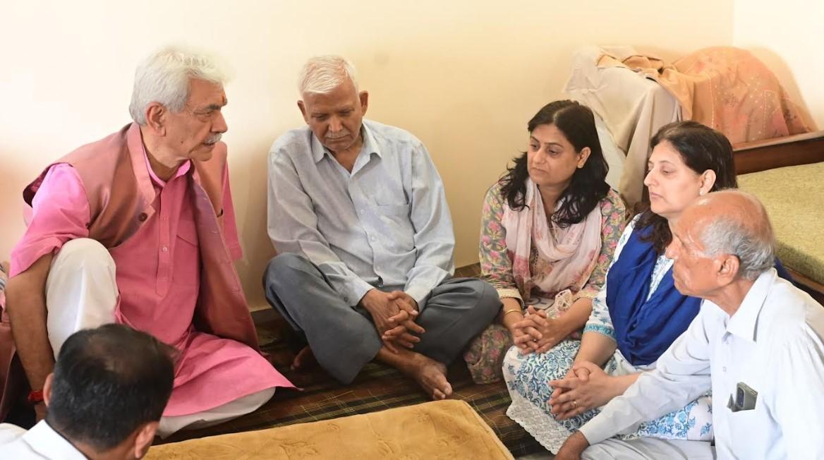 LG Sinha visits family of ADDC Rajouri Raj Kumar Thapa in Jammu