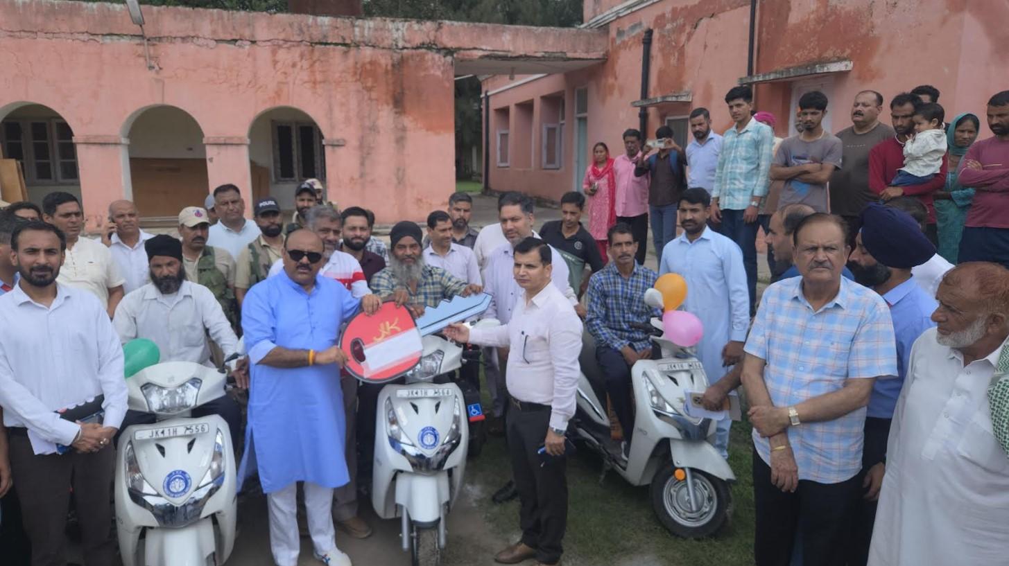 Dy. CM  distributes appointment letters, motorized  tricycles among  beneficiaries at Nowshera