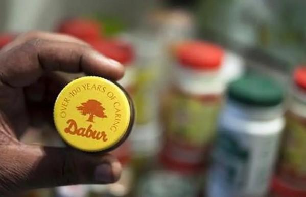 FSSAI bans Dabur from selling honey, cow ghee, coconut oil with '100%' claims, asks it to submit ATR report