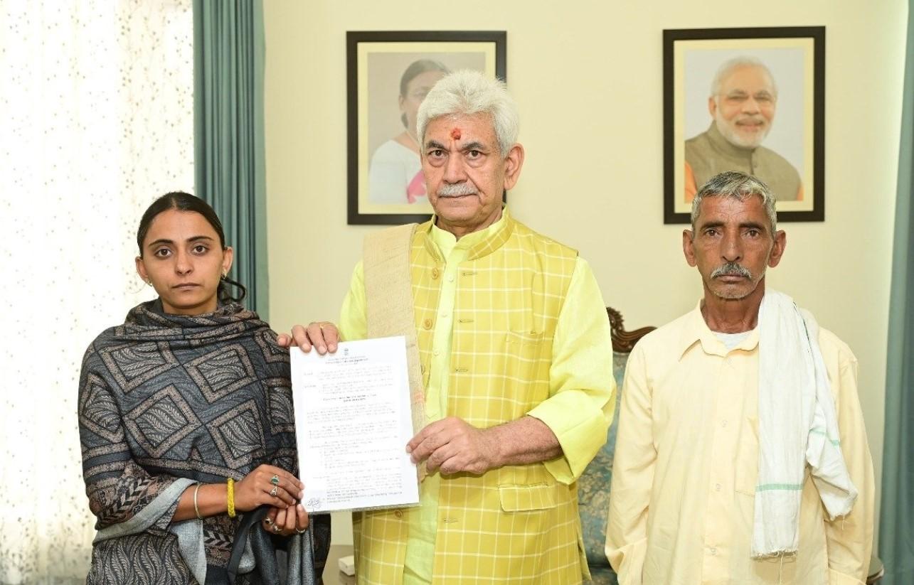 LG Manoj Sinha hands over appointment letter to sister of Bus Conductor martyred in Reasi Terror attack