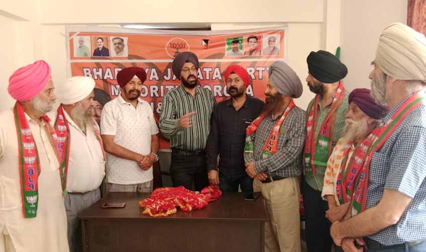 Several prominent persons join BJP at party headquarters at Jammu